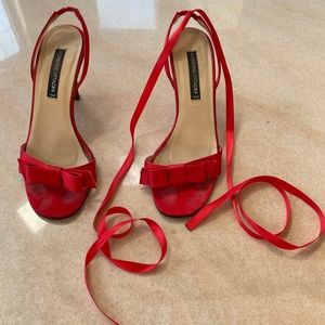 Cherry  Red satin heels.